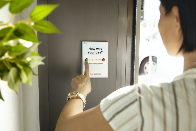 Female employee submitting feedback for a business enterprise